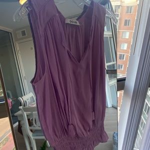 Purple sleeveless blouse. Tie at neck, elastic waist. Size L